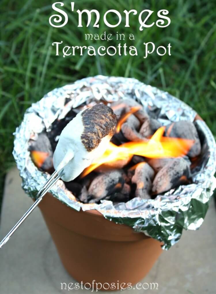 15 Creative Ways to Use Flower Pots (Besides Gardening): Make s'mores in a terracotta pot