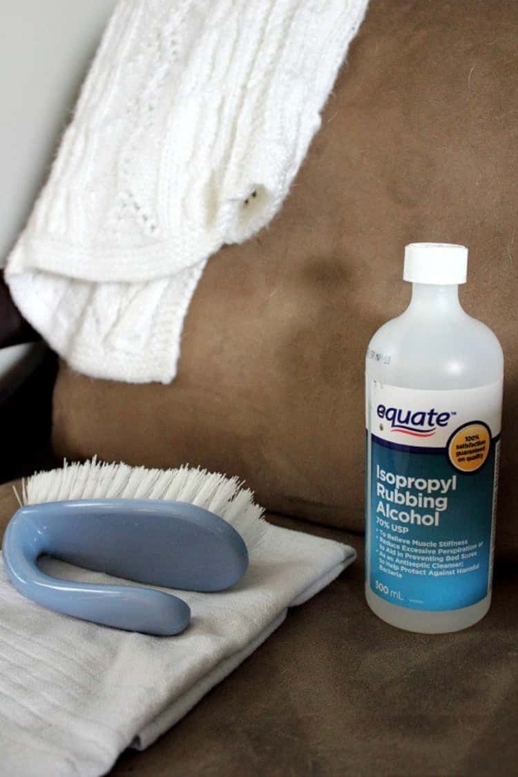 stain removal - rubbing alcohol, scrubbing brush and rag on microfiber couch