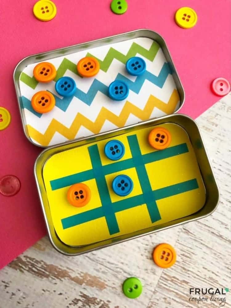 DIY magnetic tic tac toe travel game made from an empty altoid tin