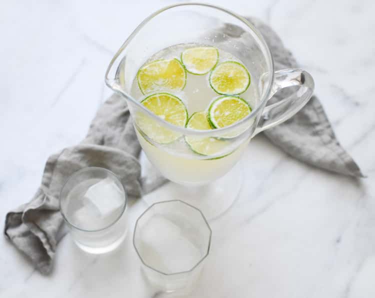 Vanilla Lime Fizzy mocktail in pitcher and 2 glasses. 