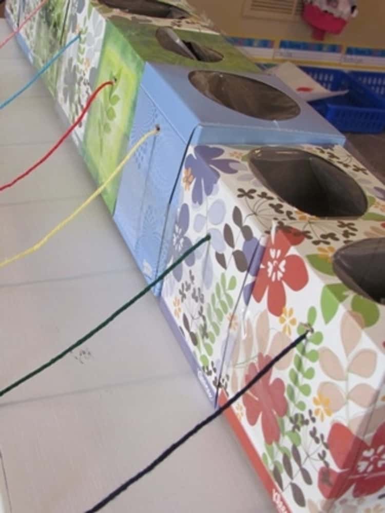 DIY Yarn Dispenser made from tissue boxes that are then taped together