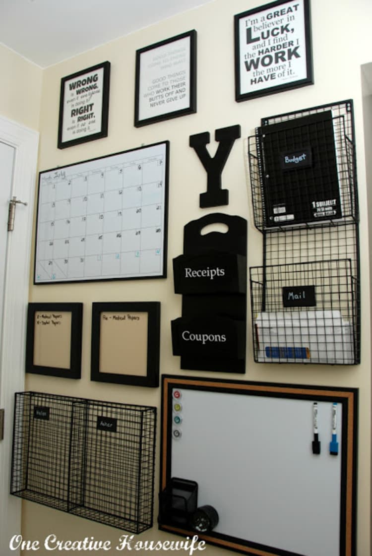 chick black and white commant center with mesh folders and baskets and a dry-erase board