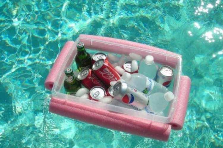 uses for pool noodles- cut noodles attached to a clear plastic bin containing ice and drinks floating in a pool