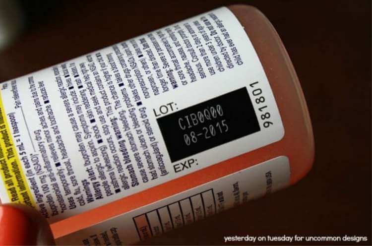 zoomed in view of medicine bottle to see expiration date