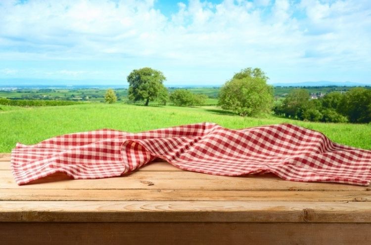 This DIY deck idea is an outdoor rug is made from and old table cloth. You can use any table cloth to match your new deck idea decor.