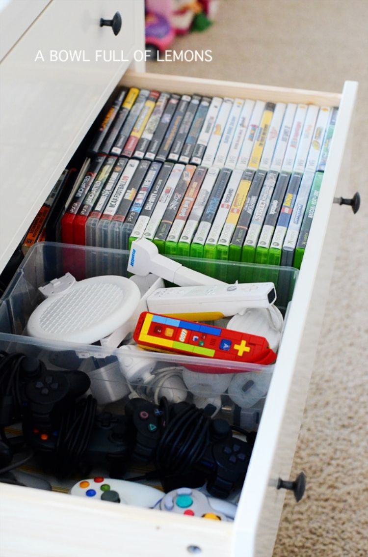 Turn a dresser with drawers into a DIY entertainment center and use the drawers to stash all your tech and dvds.