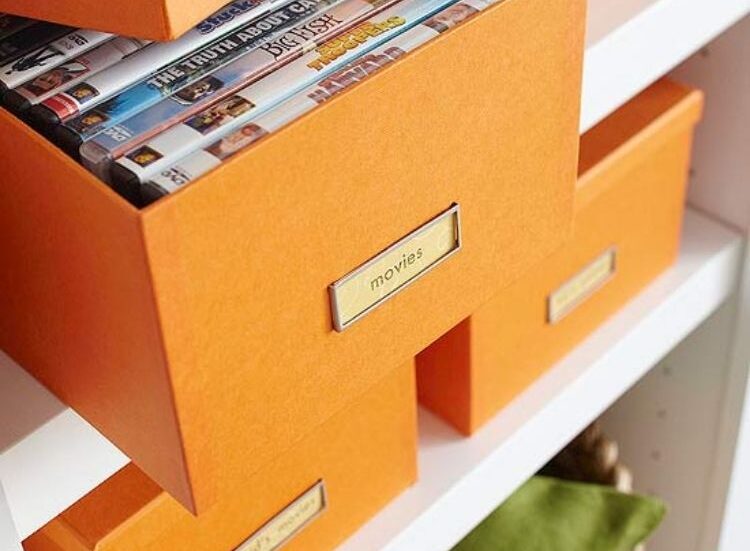 Brightly colored media boxes make great chic looking storage for all your dvds and you can get them in all kinds of fun colors. 