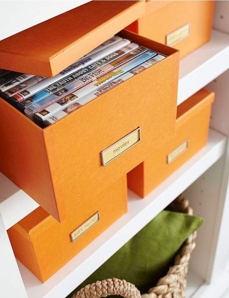 Brightly colored media boxes make great chic looking storage for all your dvds and you can get them in all kinds of fun colors. 