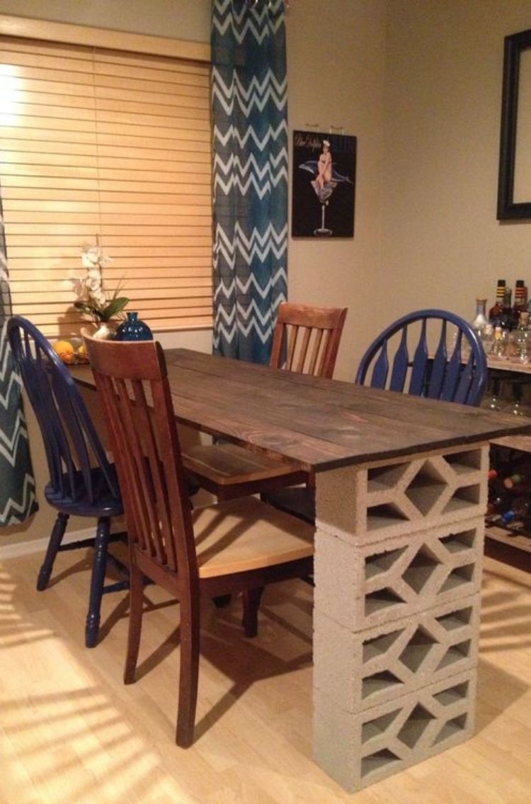 How clever is this cinder block table leg idea? Easily use decorative cinder blocks to stick under a custom table top in your kitchen. 