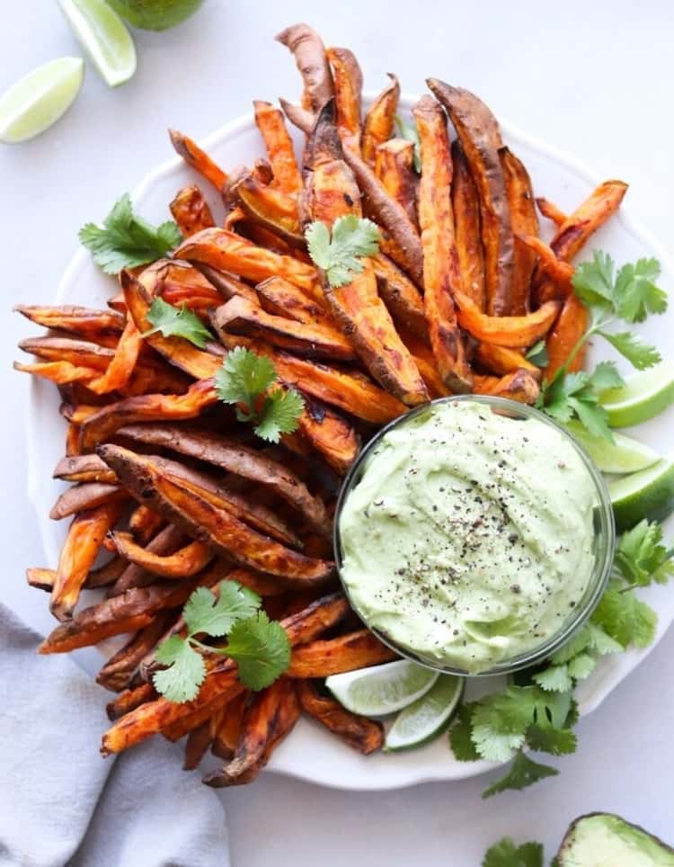 Air fryer sweet potato fries with an avocado aioli for a plant-based meal 