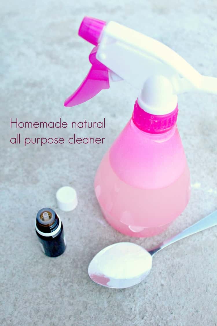 A spray bottle, essential oil container and spoon.