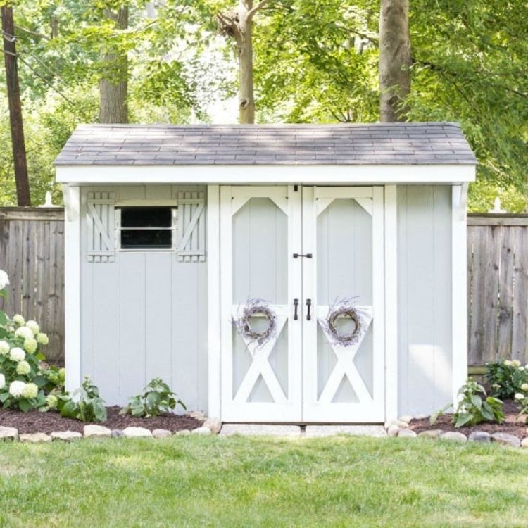 Dress up the outside of the shed with new siding and a fresh coat of paint