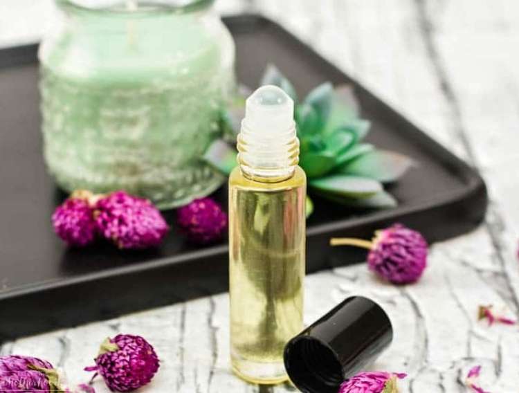OneCrazyHouse gifts for stress relief Bottle of Essential Oil Rub On in front of tray with counter