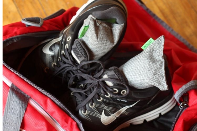 tennis shoes in a reb gym bag