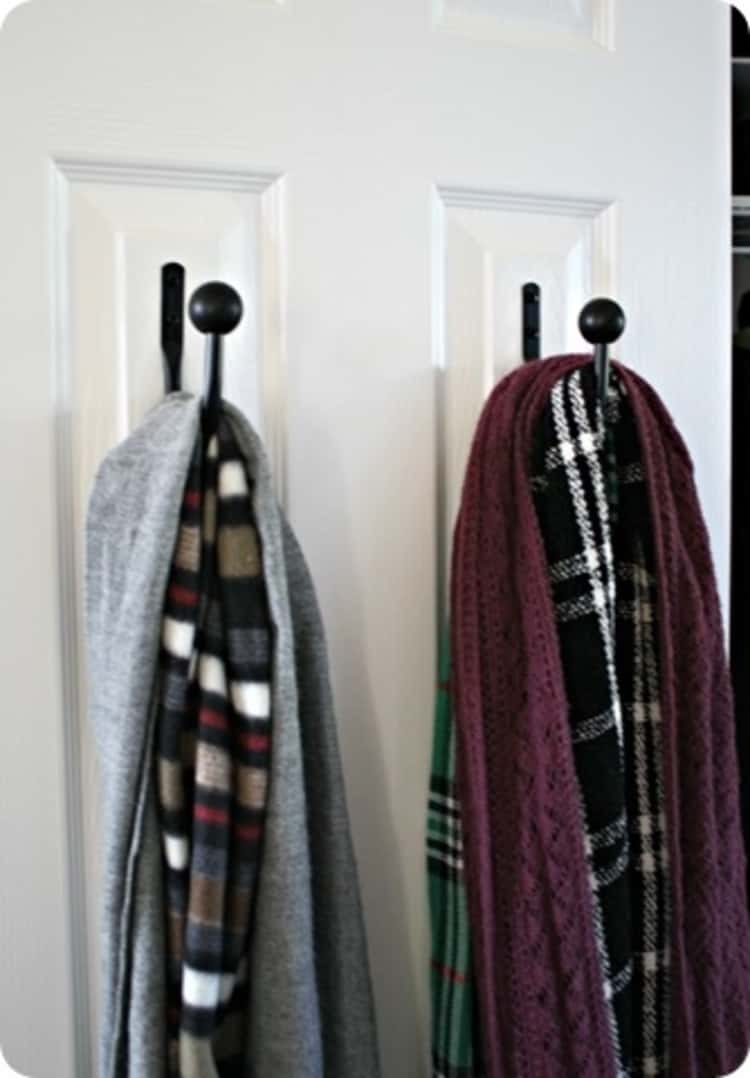 Hangers for scarves behind closet door