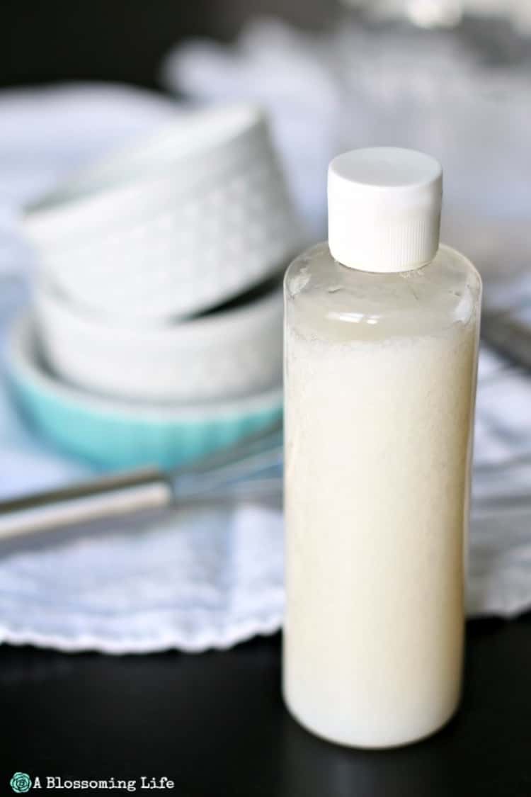 A bottle of natural, homemade dishwasher detergent 