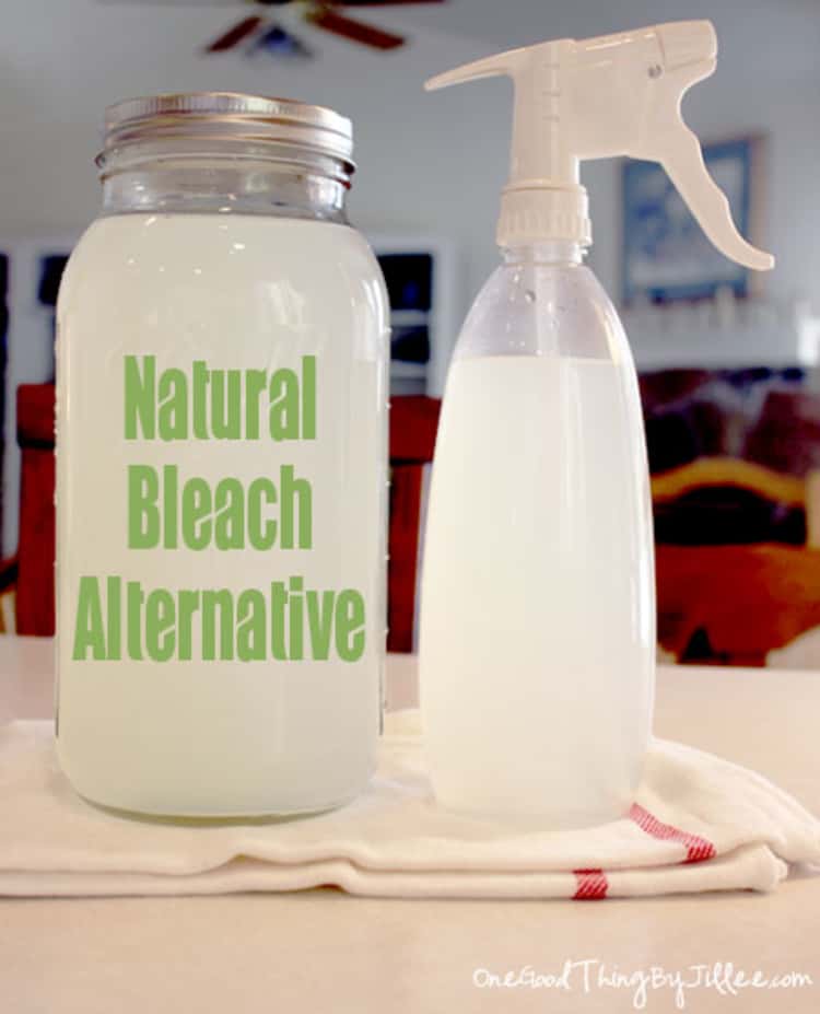 Homemade natural bleach in a glass jar and a spray bottle 