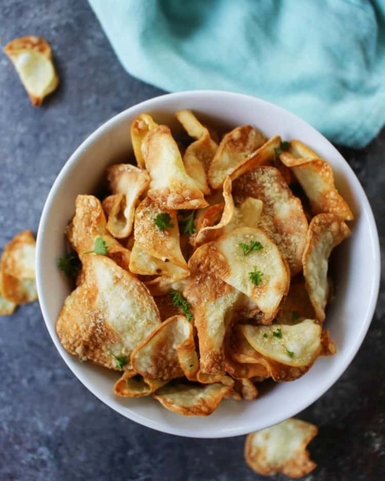 Air-fried chips in white bowl.