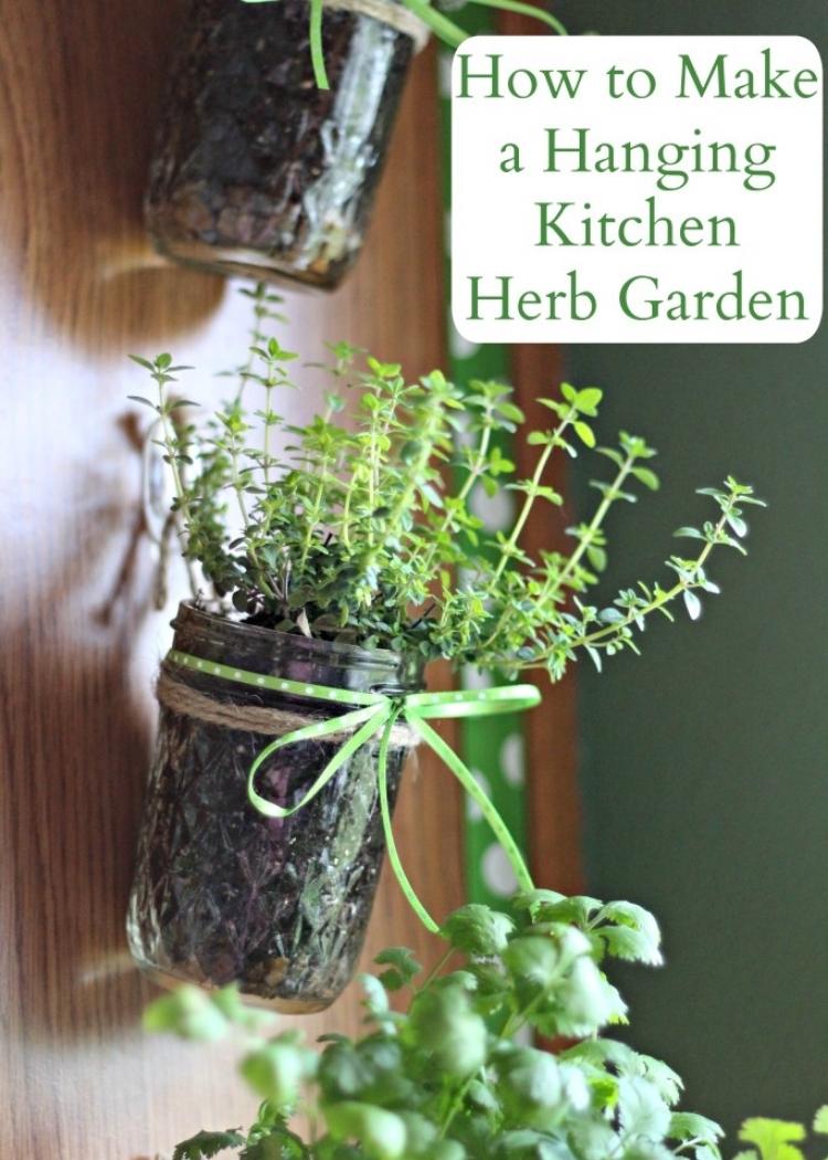 mason jars to create a hanging herb garden in the kitchen