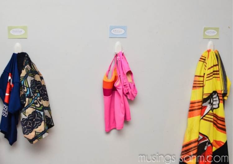 unusual command hook use hanging wet swimming suits in the shower 