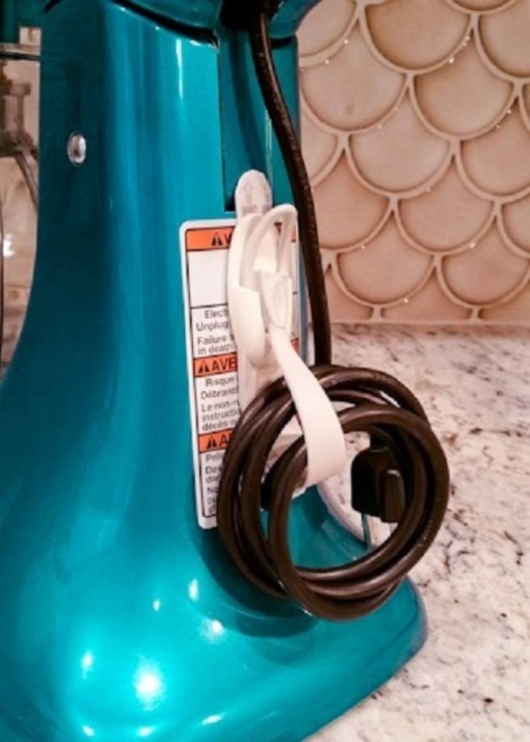 unusual command hook use - storing stand mixer cord wrapped behind the mixer on a hook 
