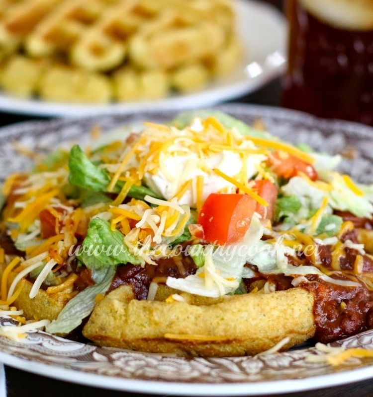 cornbread waffle with chili and all the fixins' on top