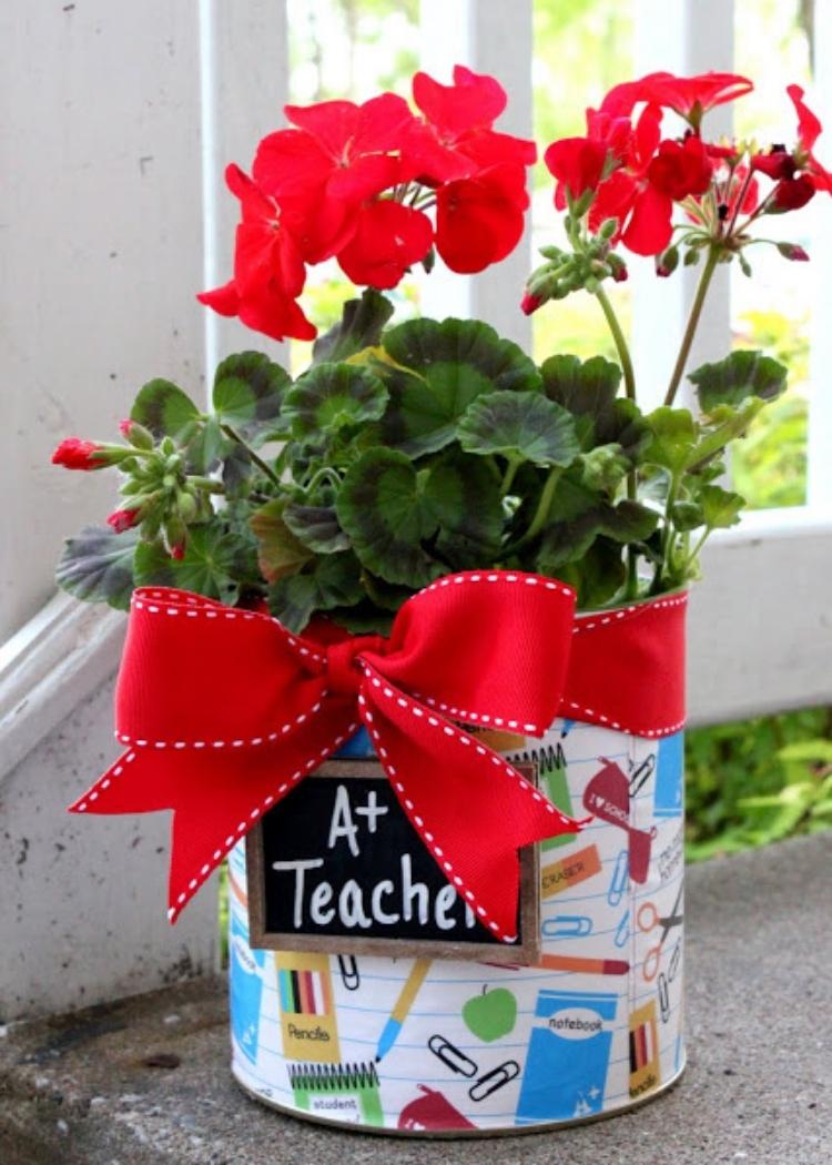 Plants adorn this reused canister and brighten up a gift quickly with ease.