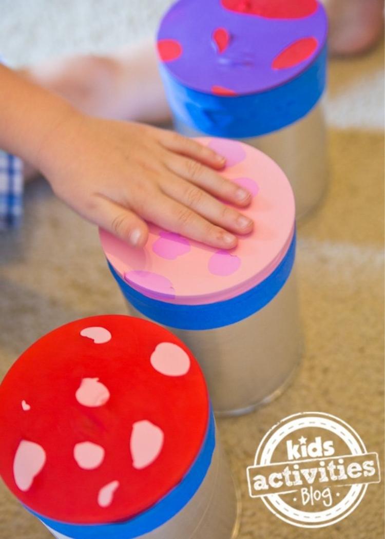 Balloons over old formula cans create a fun new toy and craft for the kids. 