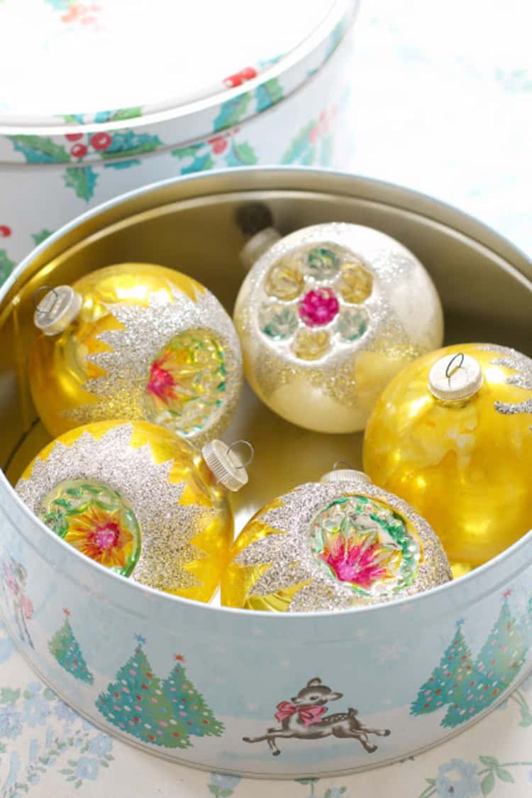 Use holiday tins to store Christmass ornaments