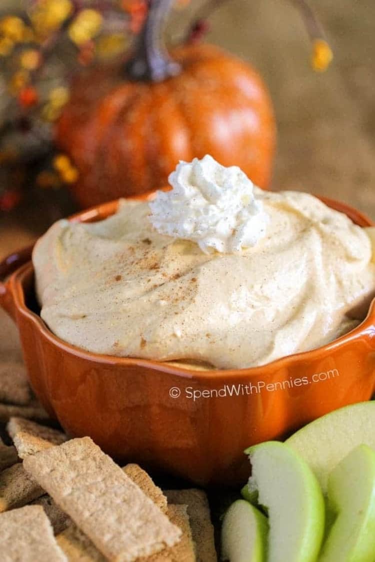 Features a cute pumpkin shaped bowl holding tasty pumpkin dip. 