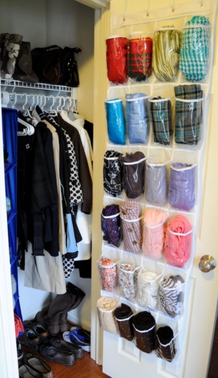 scarves rolled up in over the door shoe organizer