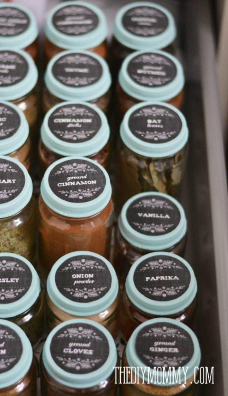 spices in matching jars lined in an open drawer