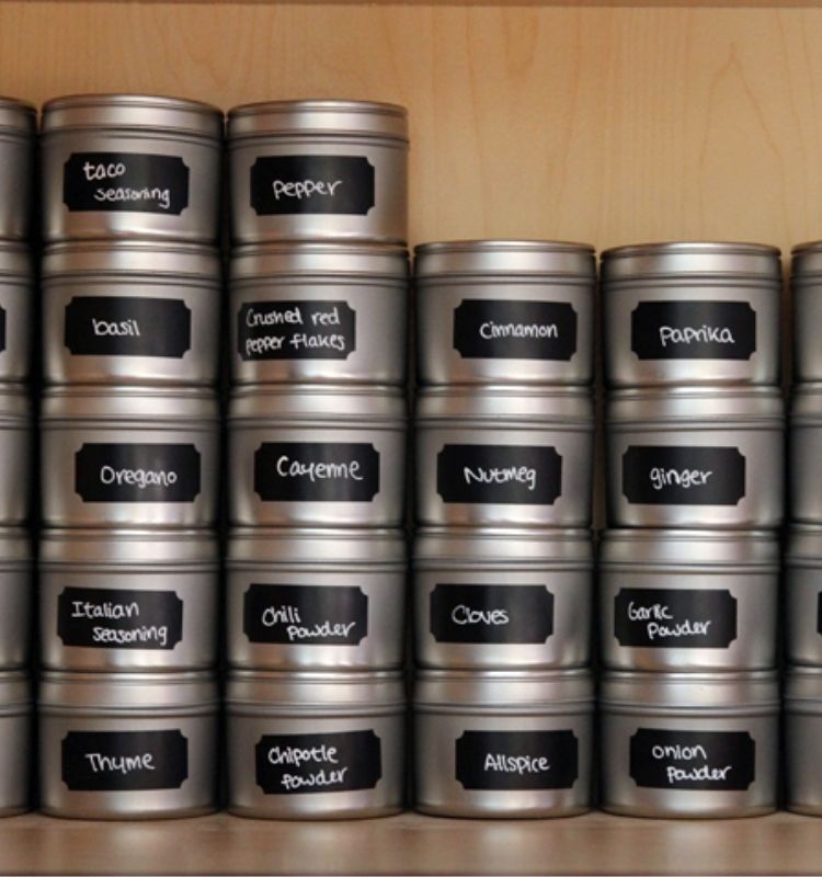 spices stacked in matching silver tins