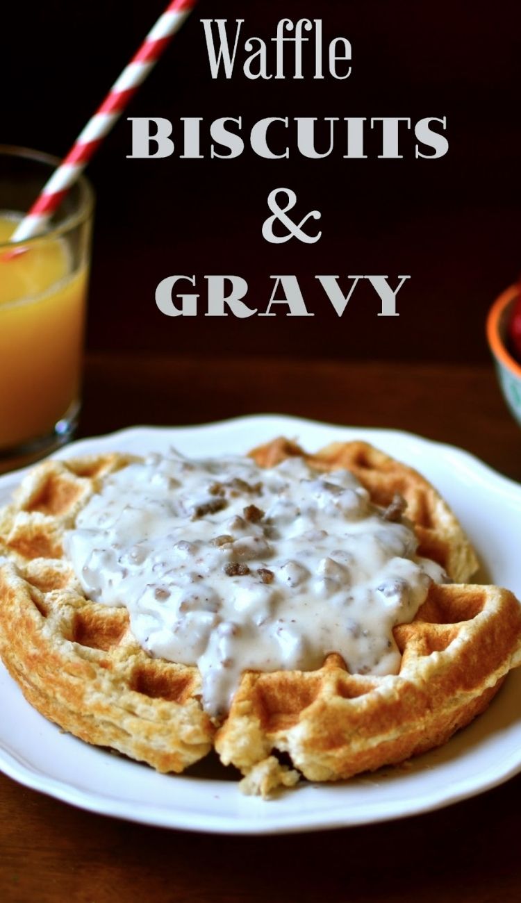 waffle biscuit and gravy with a glass of orange juice