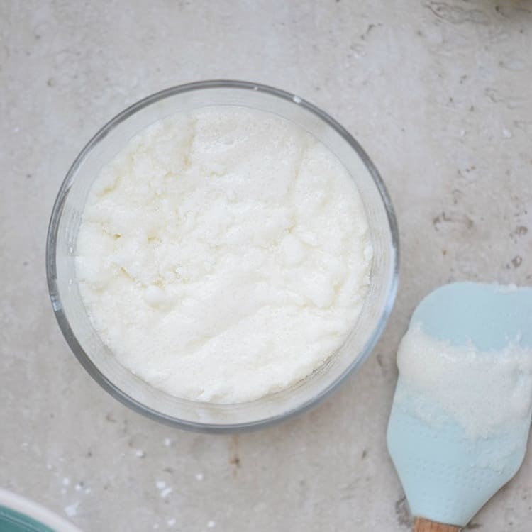 homemade grout scrub in a glass bowl