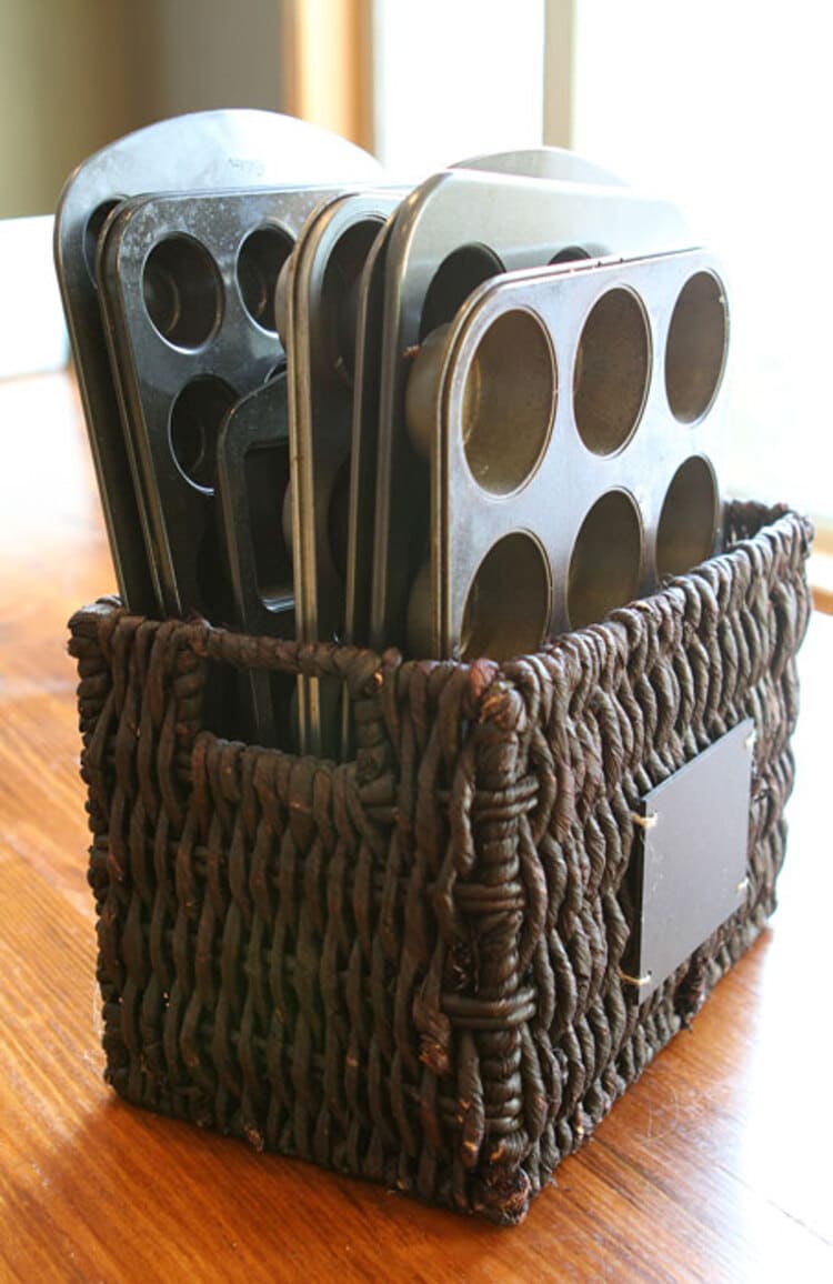 kitchen storage solutions magazine basket for cupcake pans