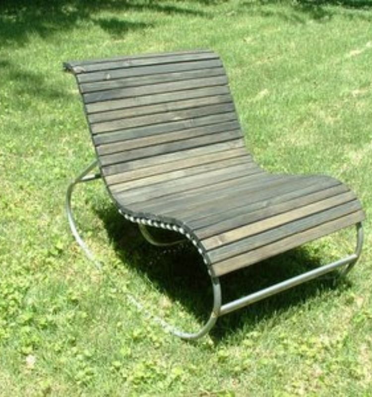 old rocker with worn wooden slats