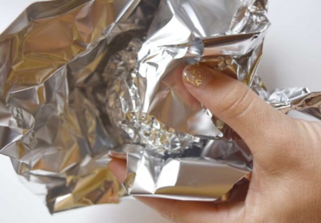 Aluminum foil in your dryer to replace sheets