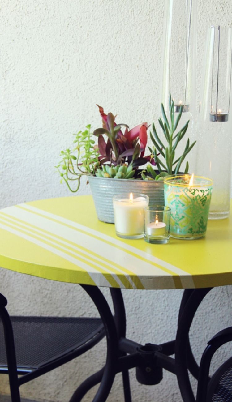 bright yellow table with iron base