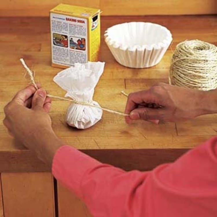 tying a string around a coffee filter to keep things fresh in fridge