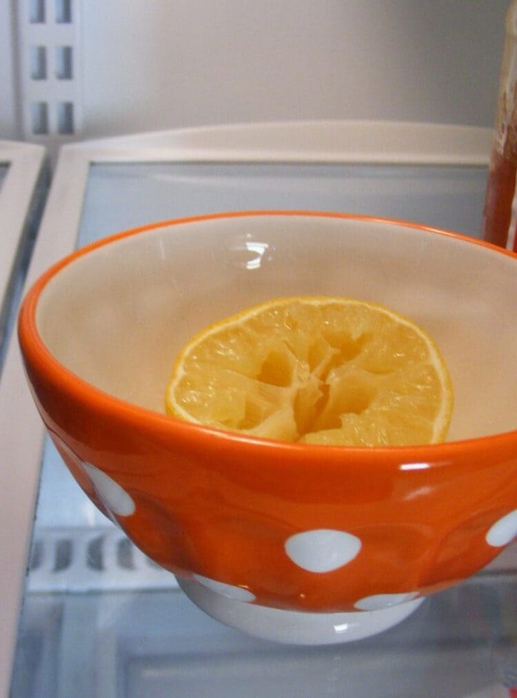 lemon in a bowl in the refrigerator