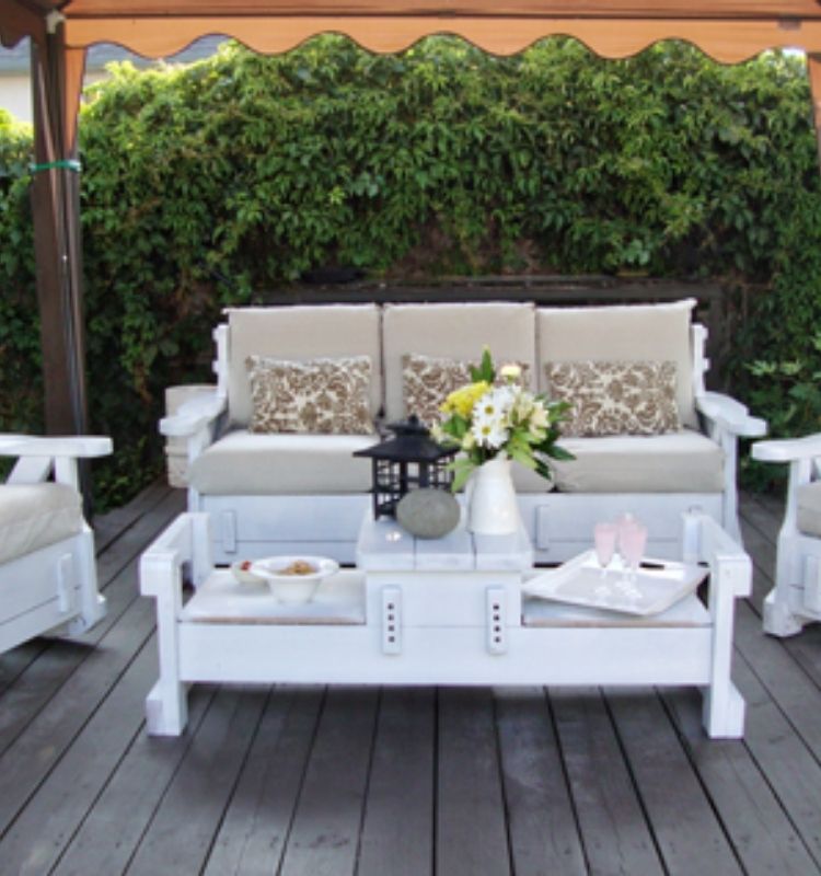white outdoor living room on a wood deck
