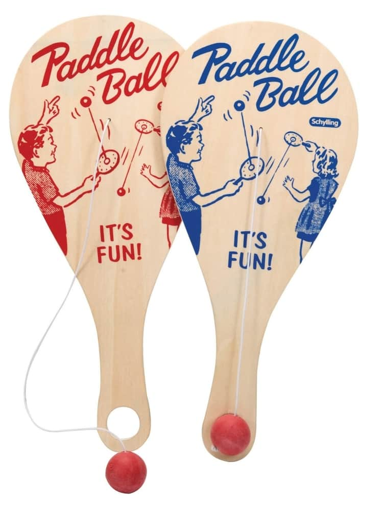 Photo of a red and blue vintage inspired paddle ball games.