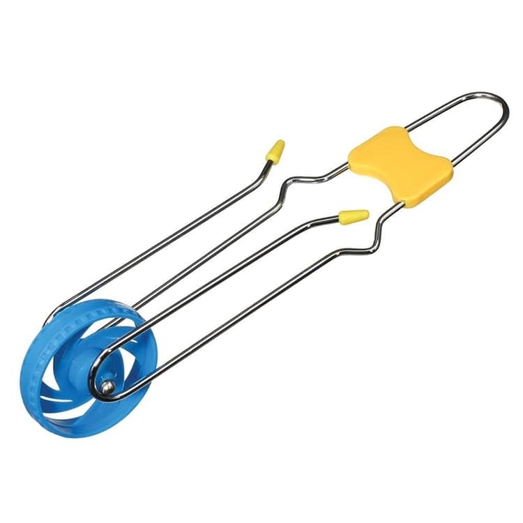 Photo of a vintage slider toy featuring a blue rolling wheel part and yellow accents.