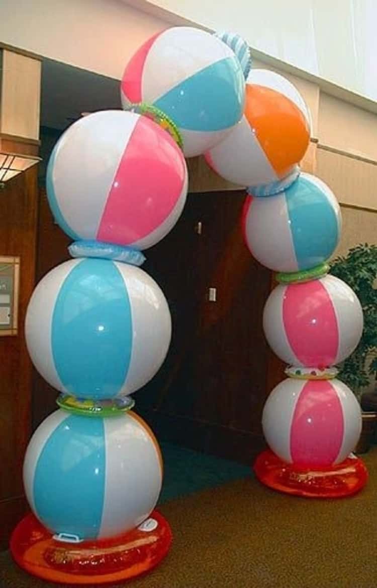 Party entrance decorated with beach balls - colorful!