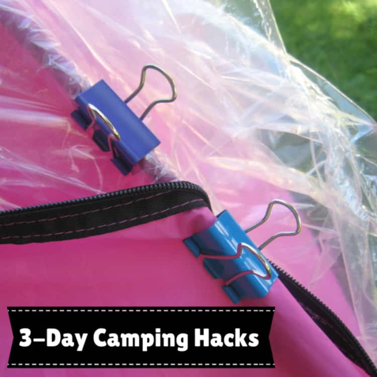 binder clips used to fasten a plastic sheet to a tent