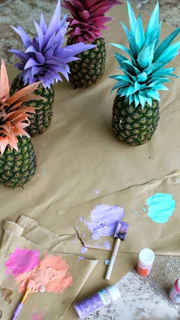 Colored pineapples used as a centerpiece 