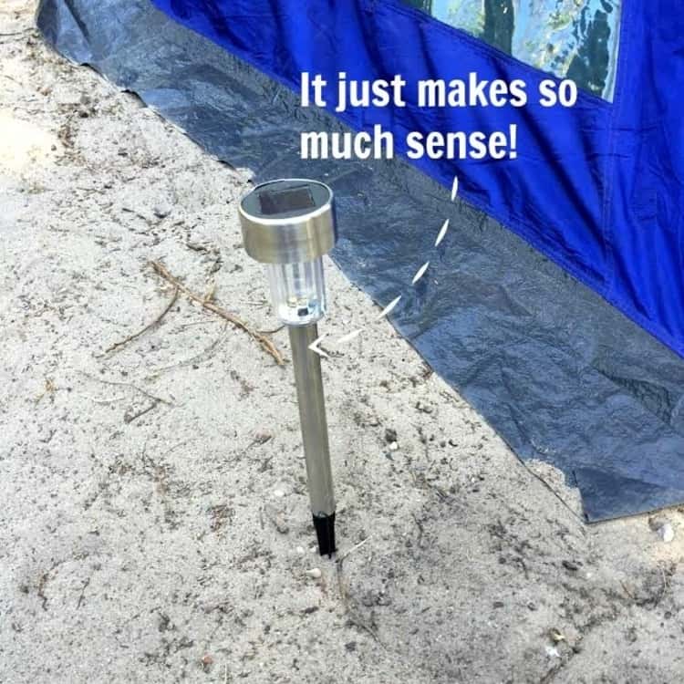 solar lights outside a tent to light the way