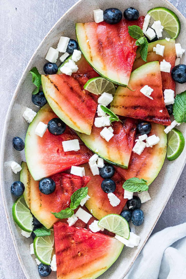 21 Best Salads for BBQ Season - watermelon, blueberry, lime, feta, and mint salad