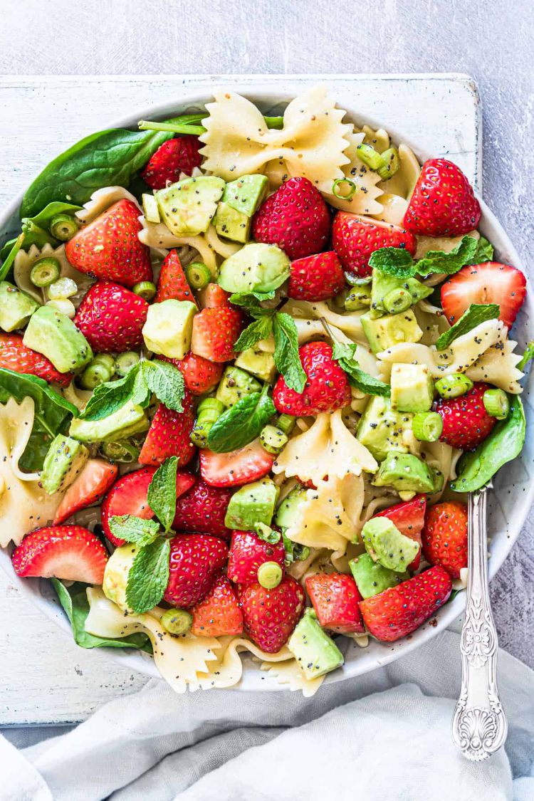 pasta salad made with strawberries and avocado chunks
